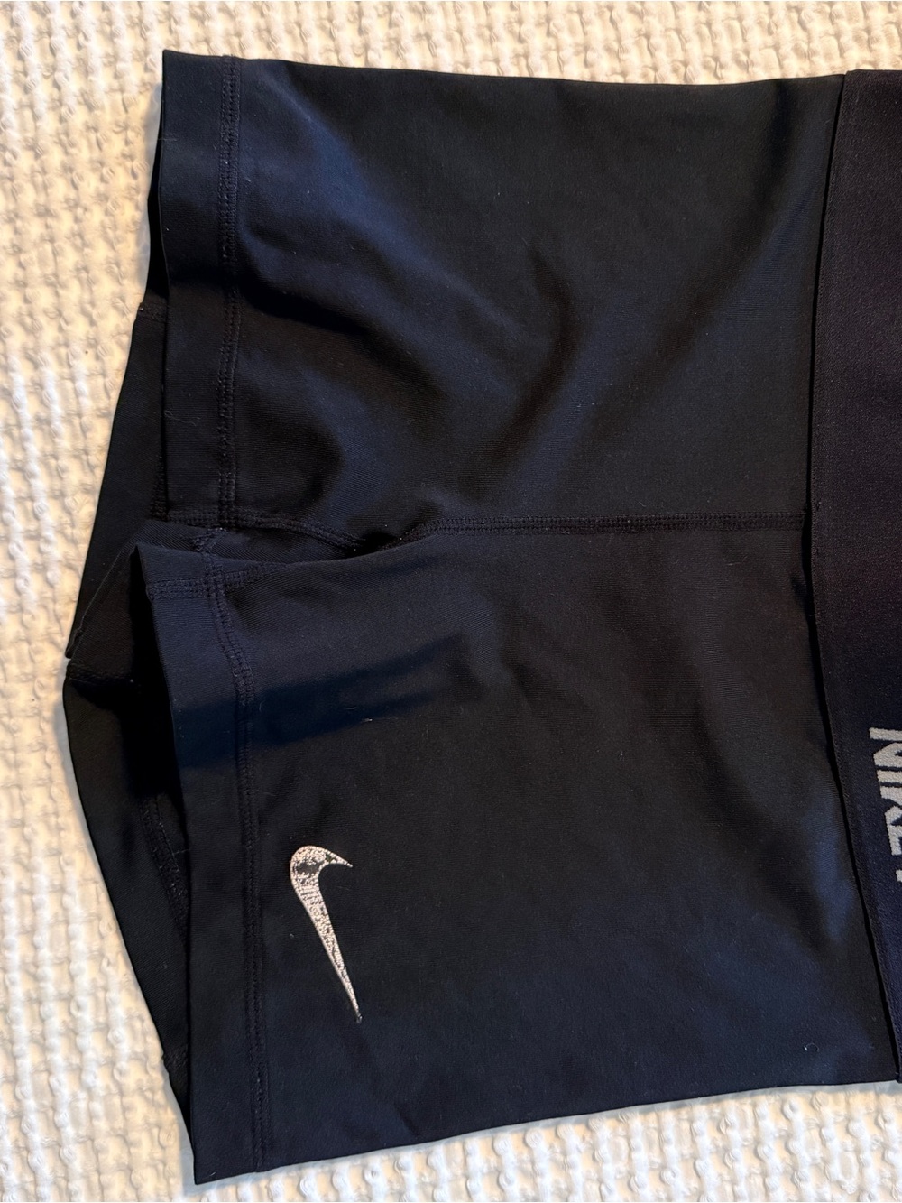 Nike Women’s Black Athletic Shorts with White Swoosh